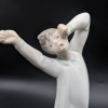 Lladro Boy Yawning Figurine